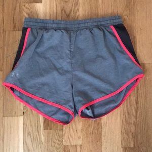 Grey, pink, and black under-armour shorts